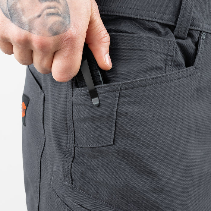 Pocket knife in reinforced pocket of the BRUNT 9 inch water resistant stretch work short in charcoal