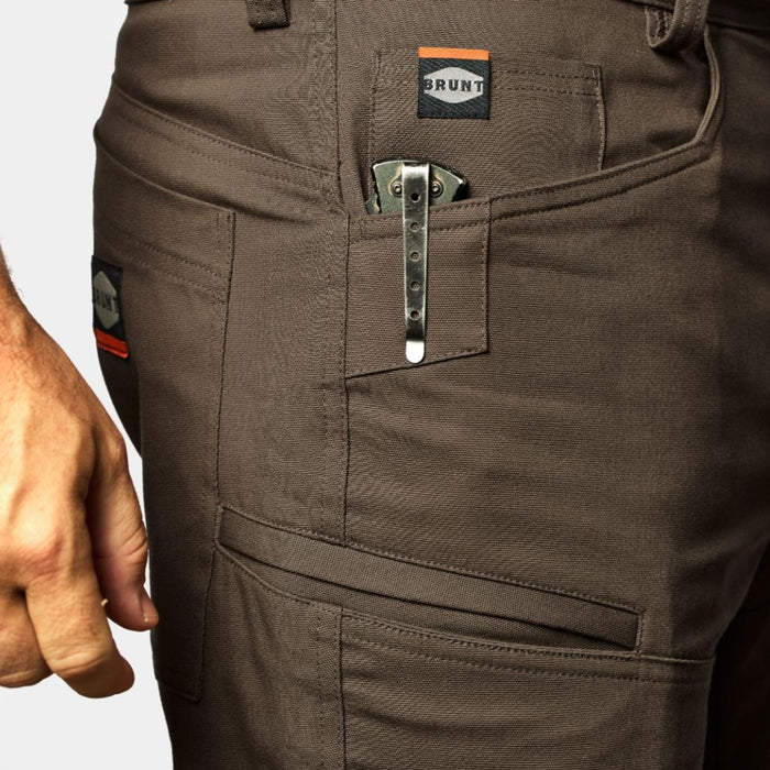 View 2 front pocket reinforcements of BRUNT abrasion resistant torra hd work shorts in brown to hold knife * 0