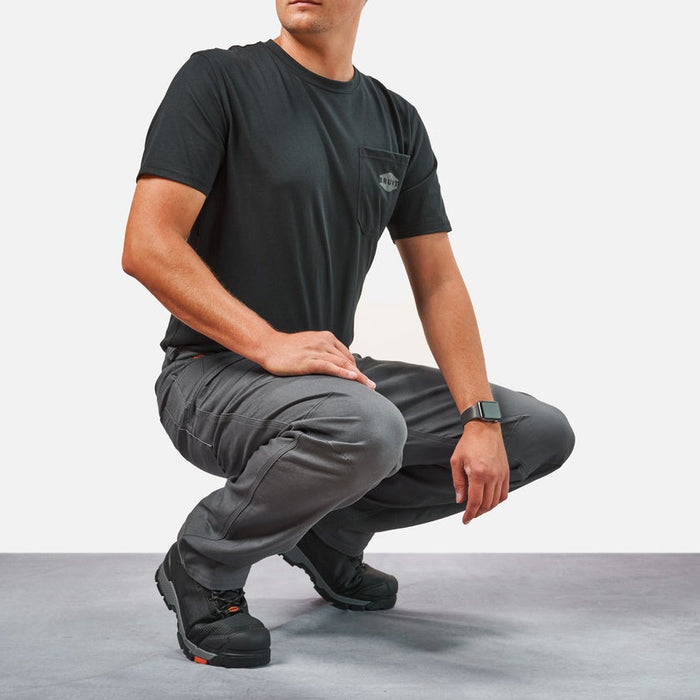 Squatting in BRUNT water resistant stretch torra work pant in charcoal * 3