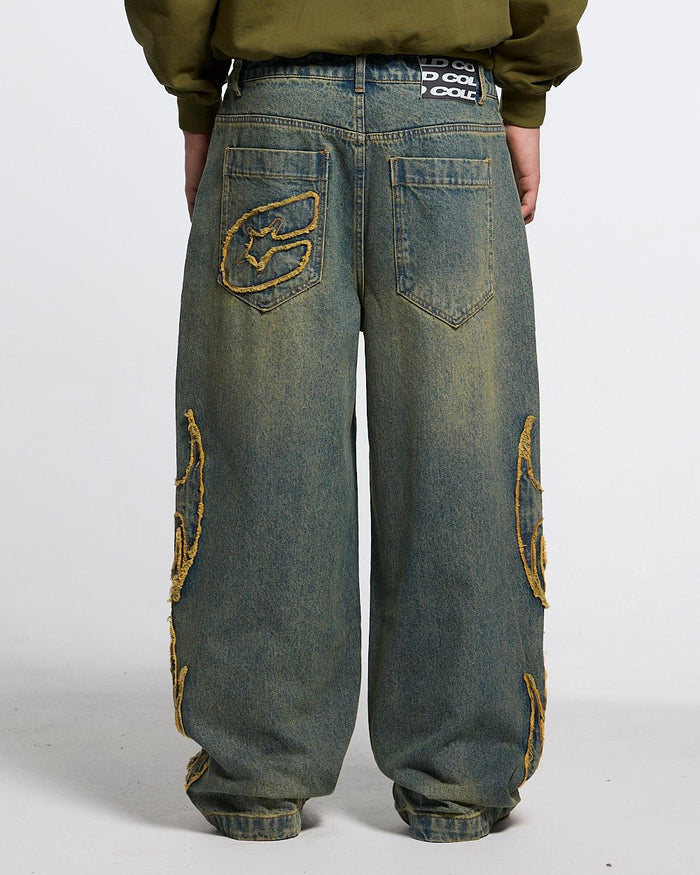 TRIBAL DISTRESSED V2 PANTS GREEN WASHED DENIM - distressed green denim pants, back view on male model - Cold Culture #man