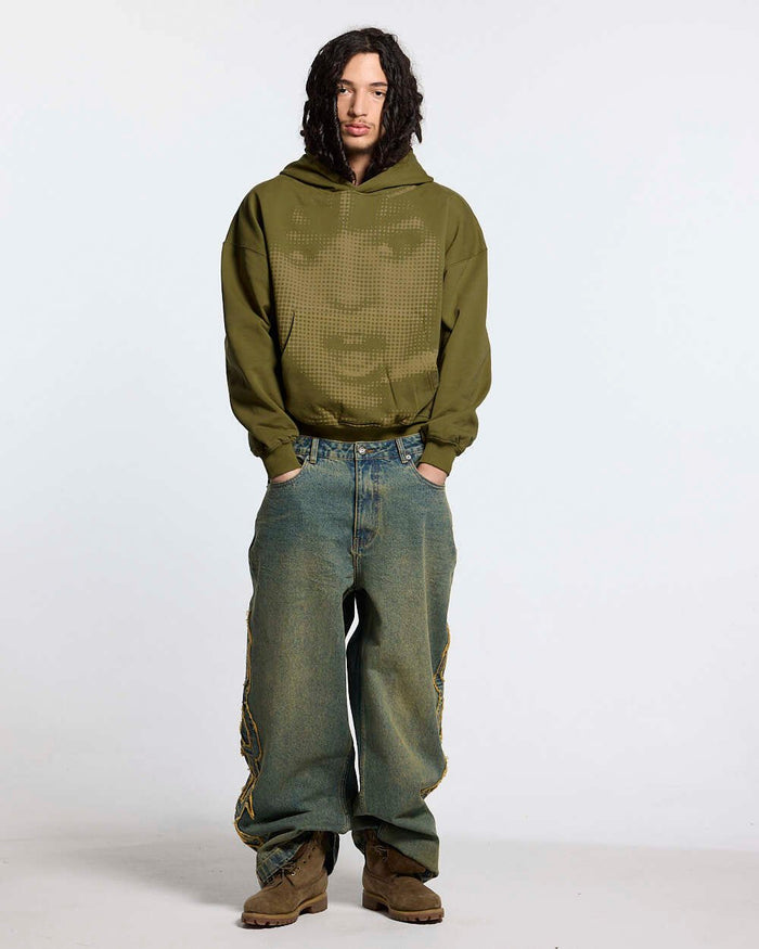 TRIBAL DISTRESSED V2 PANTS GREEN WASHED DENIM - distressed green denim pants, front view on male model - Cold Culture #man