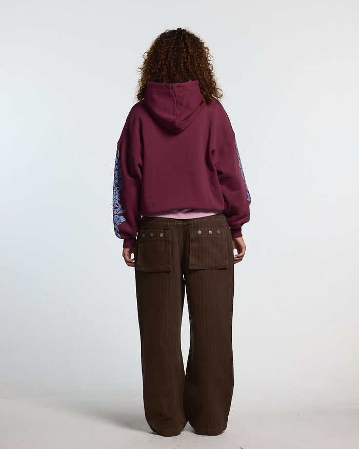 TRIBAL HOODIE BURGUNDY - burgundy tribal print hoodie, back view on female model - Cold Culture #woman