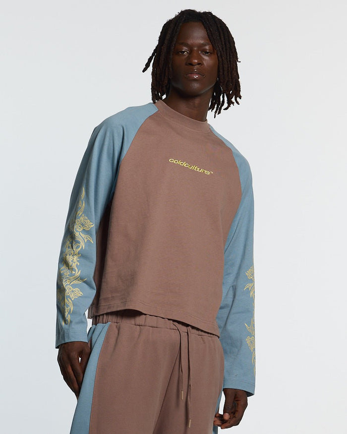 TRIBAL LONGSLEEVE BROWN & BLUE - brown and blue tribal longsleeve tee, front view on male model - Cold Culture #man