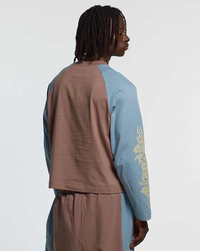 TRIBAL LONGSLEEVE BROWN & BLUE - brown and blue tribal longsleeve tee, back view on male model - Cold Culture #man