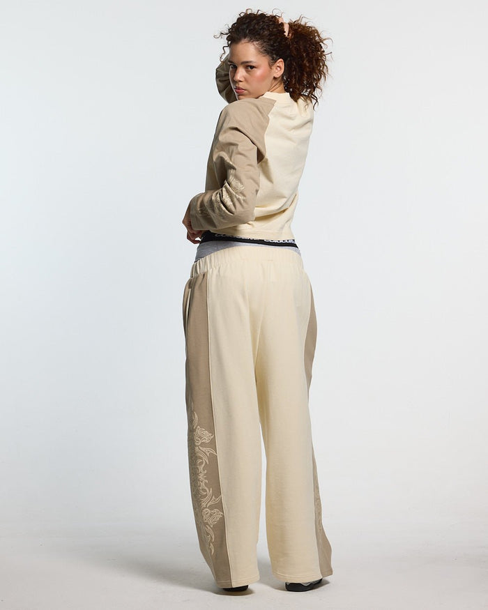 TRIBAL LONGSLEEVE GREY & OFF WHITE - off white tribal longsleeve tee, back view on female model - Cold Culture #woman