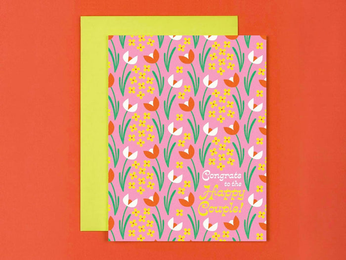 Greeting card with floral design and text on a red background