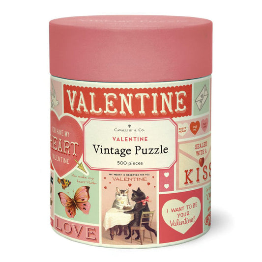Valentine-themed puzzle packaging with a pink lid and colorful label on a white background