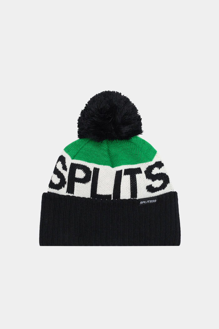 The SPLITS59 Winter Pom Pom Beanie - Black/Grass is made from 100% polyester, with a black pom-pom, green and white top, black lower section, and bold “SPLITS” lettering on the front.