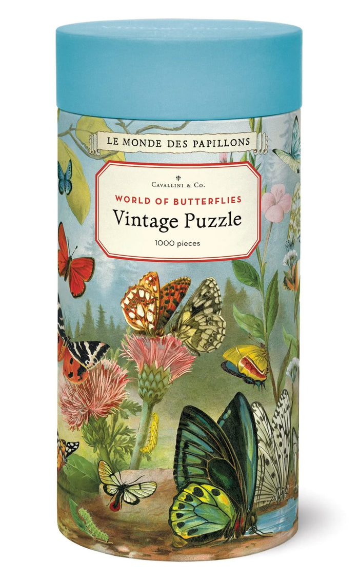 cylindrical puzzle box with butterfly design and blue lid