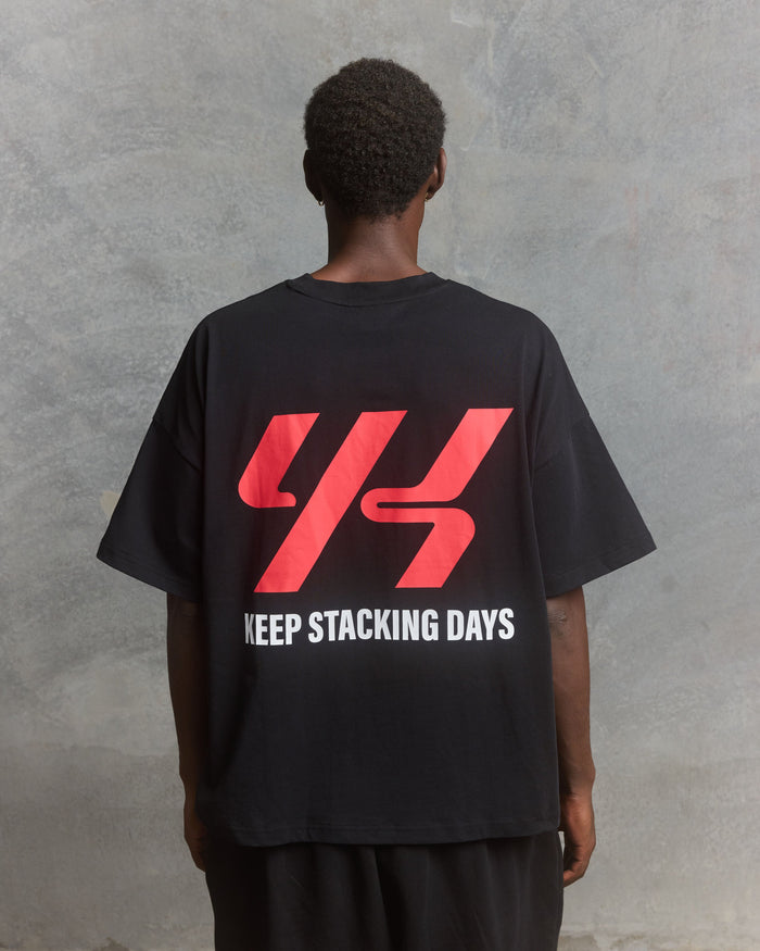 YK Move Keep Stacking Days Evolve Tee | Black